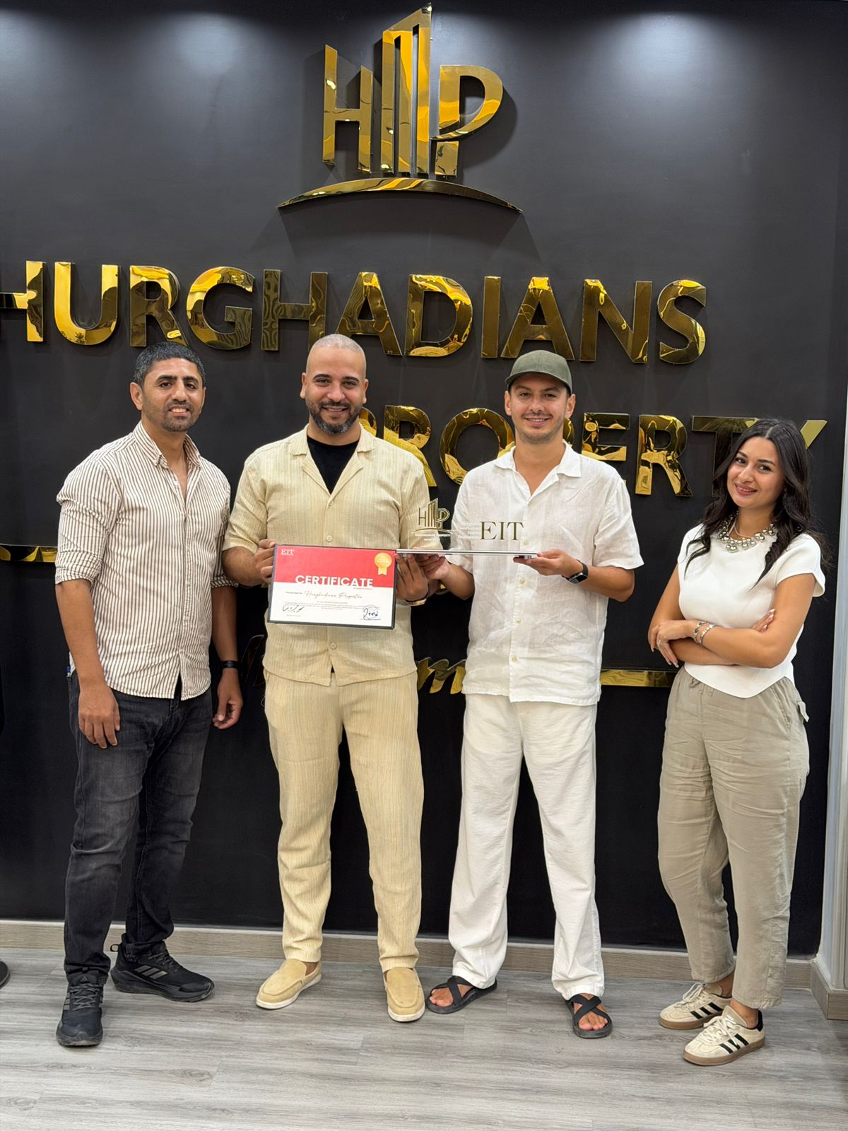 Hurghadians Property team with EIT Developments award and certificate