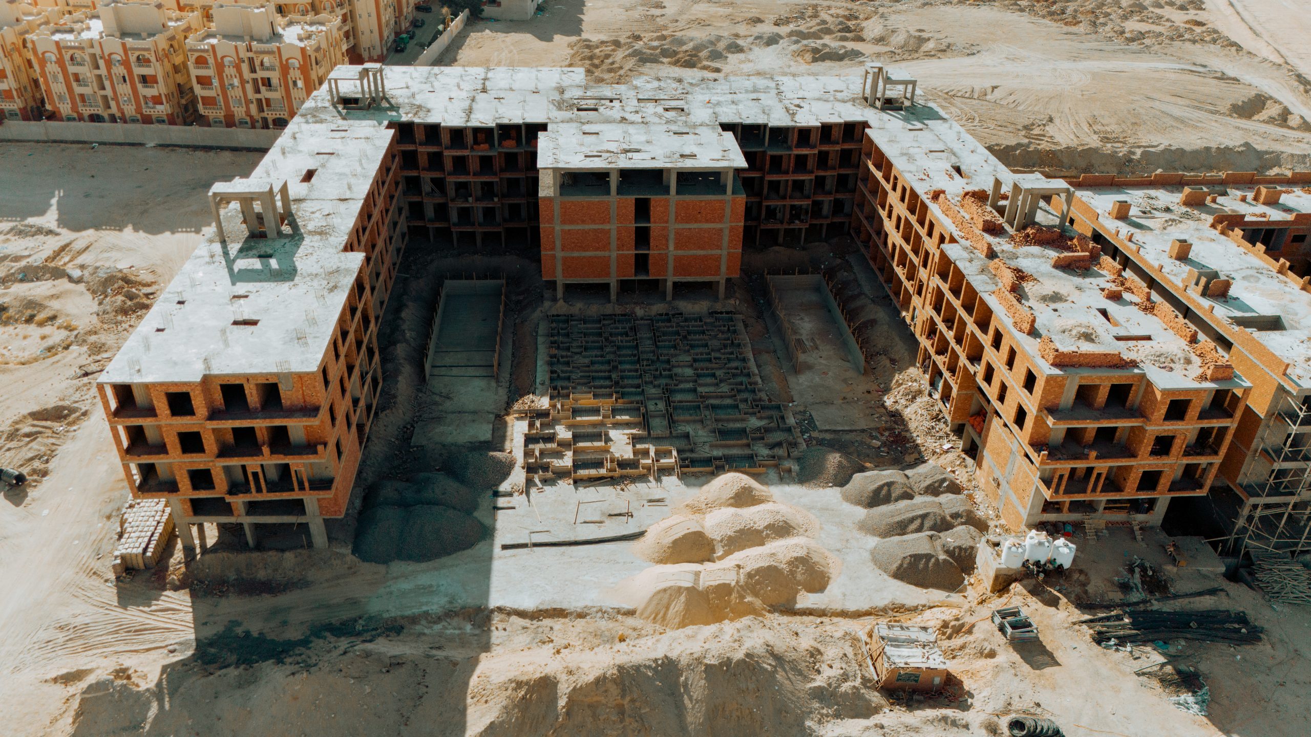 AQUA ORGWAN Resort — aerial construction view 8, July 2026