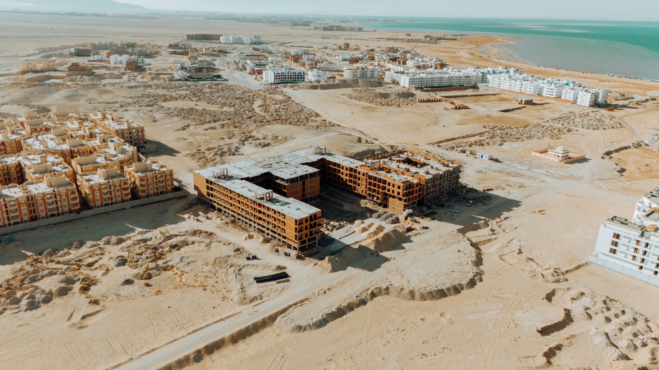 AQUA ORGWAN Resort — aerial construction view 7, July 2026
