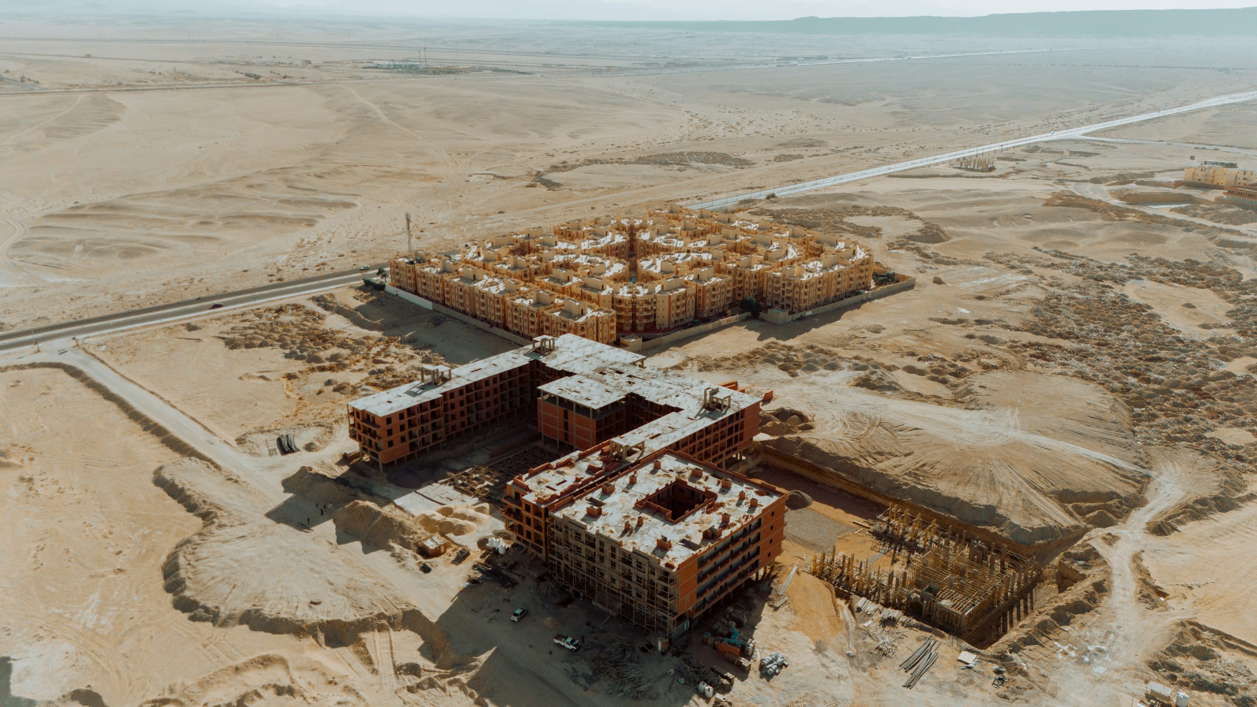 AQUA ORGWAN Resort — aerial construction view 5, July 2026