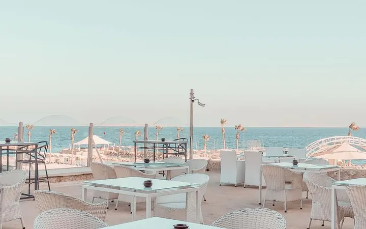 Outdoor cafe tables beside the Red Sea in Hurghada