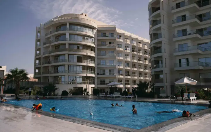 Swimmers using the pool beside Scandic Resort apartments in Hurghada