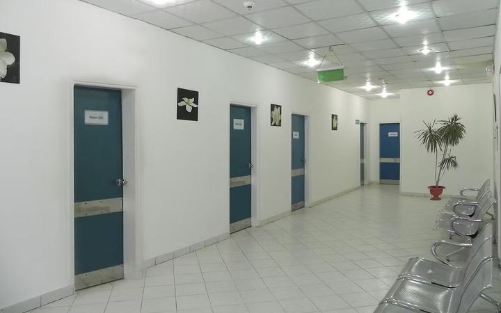Consultation-room corridor and waiting seats shown in Jasmine Hospital’s official Hurghada gallery