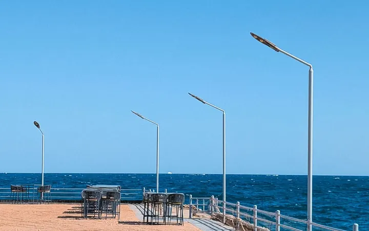 Sunlit Red Sea coastline and seaside walkway in Hurghada